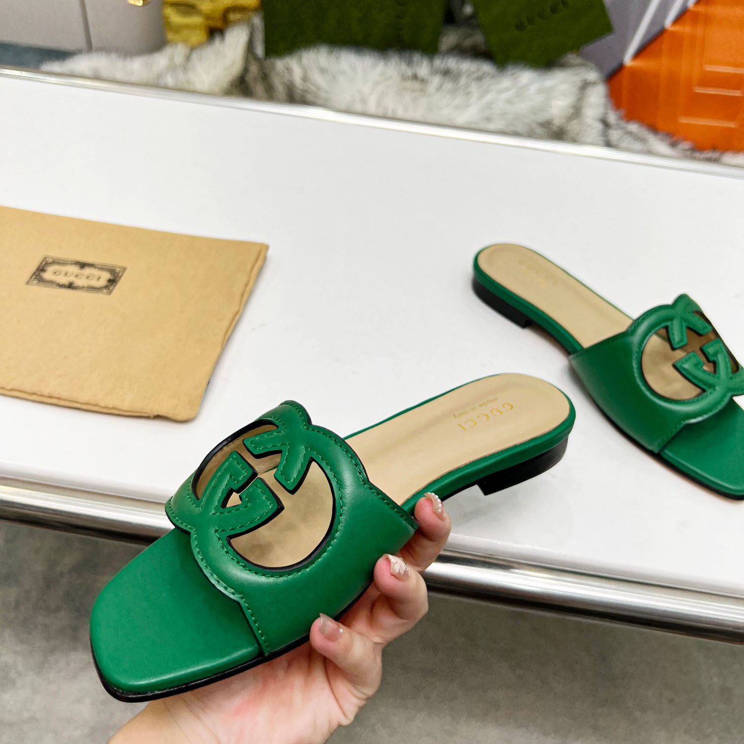Gucci Women's Interlocking G Cut-out Slide Sandal - 