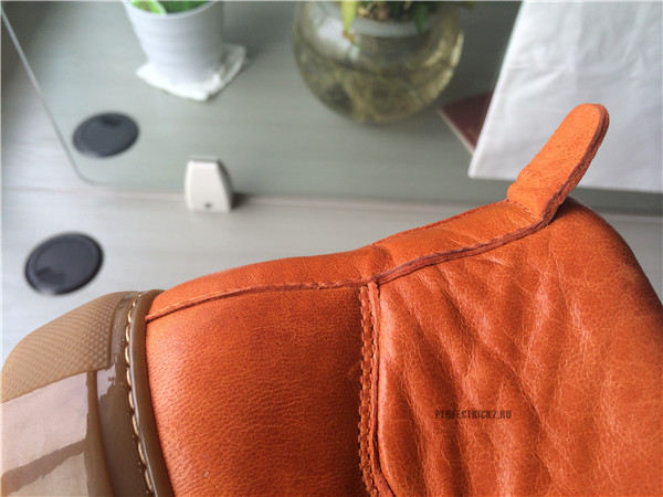 Orange Balenciaga shoes for men